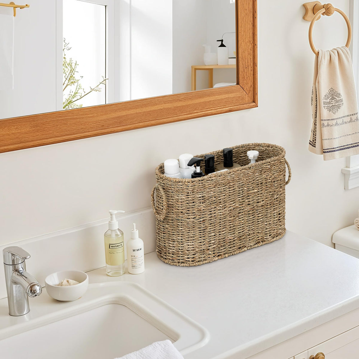 StorageWorks toilet paper storage beside sink offers accessible organization