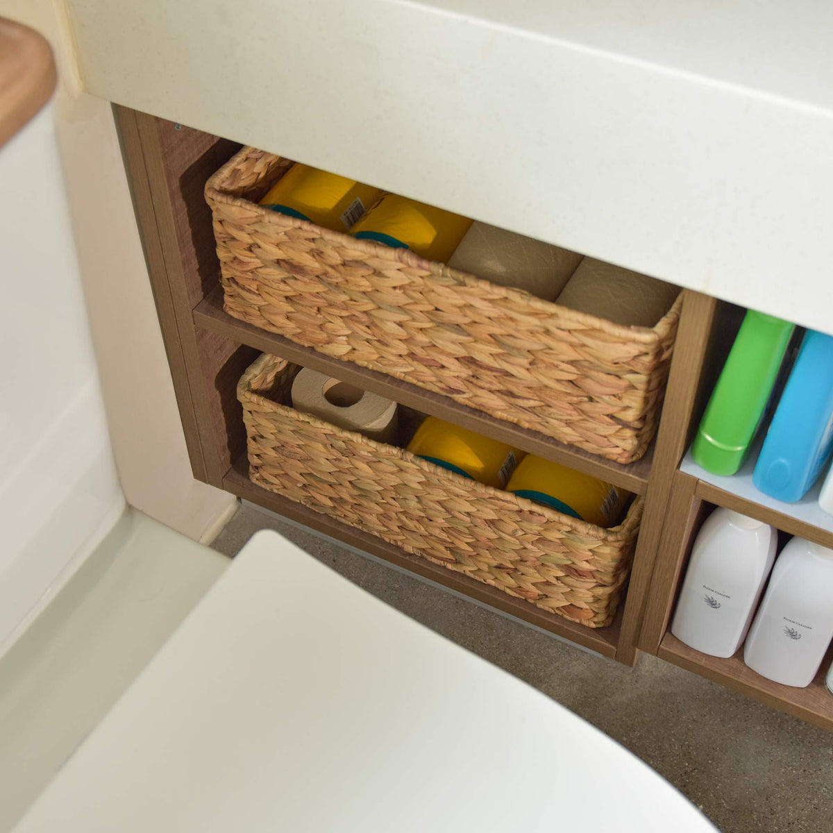 StorageWorks pair of baskets fits compact spaces on any bath surface.