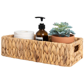 StorageWorks water hyacinth basket for toilet paper keeps essentials handy.