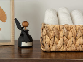 StorageWorks basket shows built-in handles for easy carrying between rooms