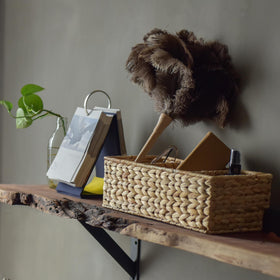 StorageWorks handwoven basket on iron frame demonstrates sturdy construction