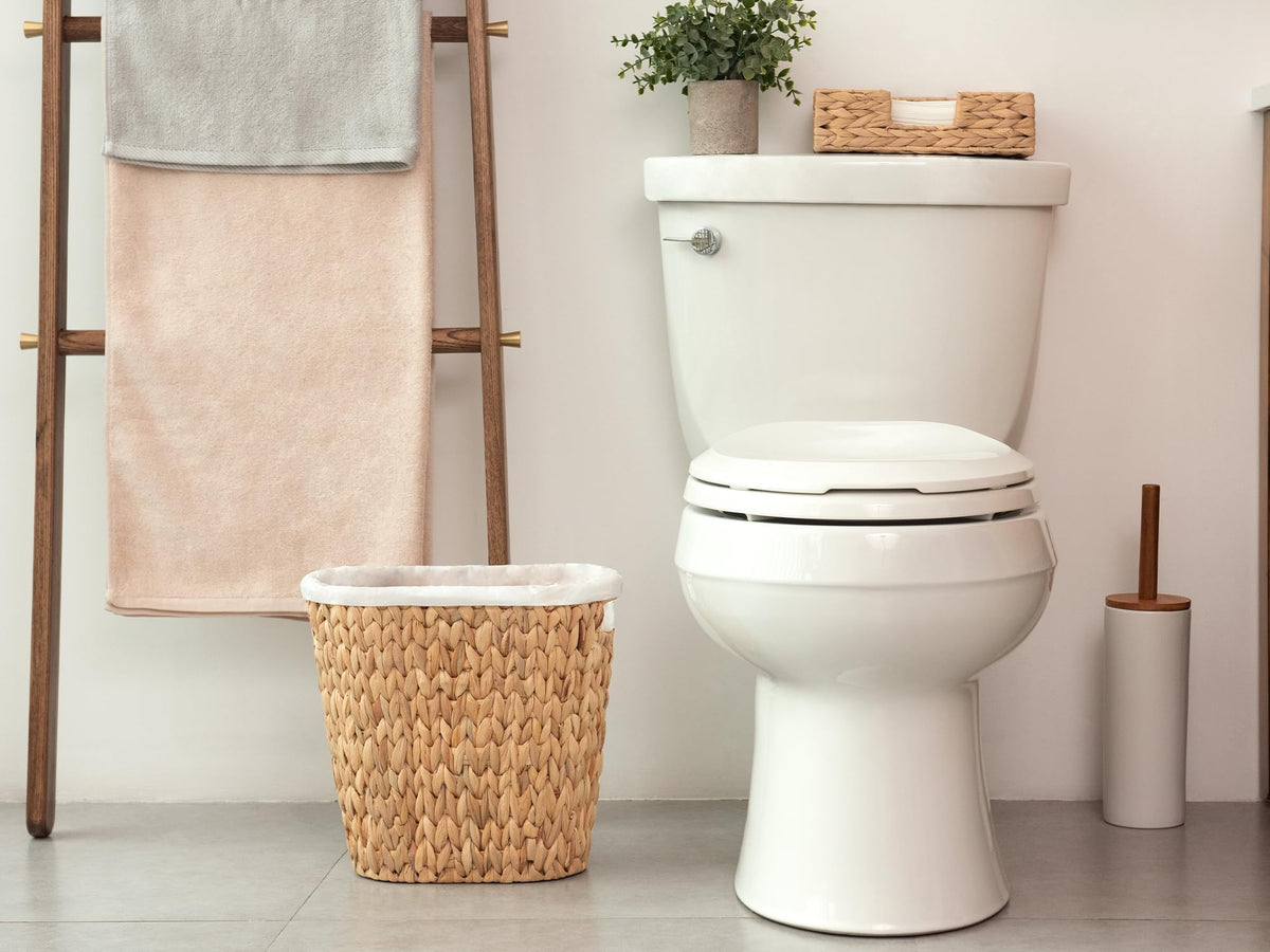 StorageWorks Wicker Waste Basket ideal for bedroom placement and decor.