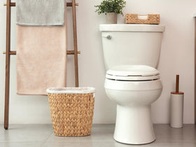 StorageWorks Wicker Waste Basket ideal for bedroom placement and decor.