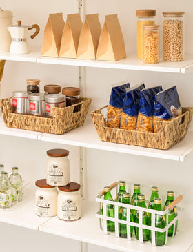 StorageWorks basket stores vegetables and onions neatly in pantry.