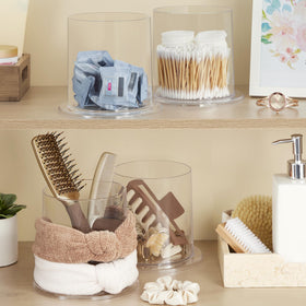 STORi Bella dresser shelf organizer holds bows, scrunchies, and clips.