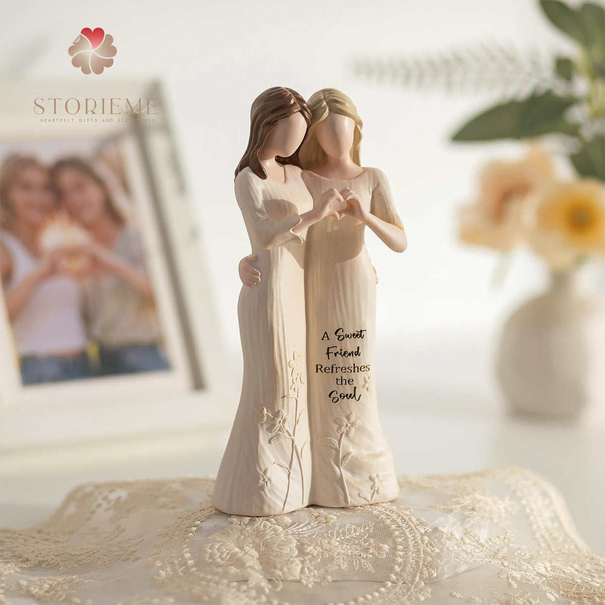 Storieme best-friend-figurine finger-heart gesture captures cherished sisterly moments.