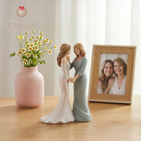 Storieme mother-daughter figurine for the dresser, capturing a proud moment.
