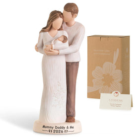 Storieme triple-embrace sculpture on a nursery shelf, symbolizing family love.