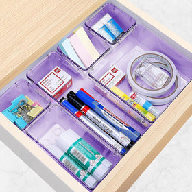 StorMiracle clear bins in a drawer reveal contents at a glance.