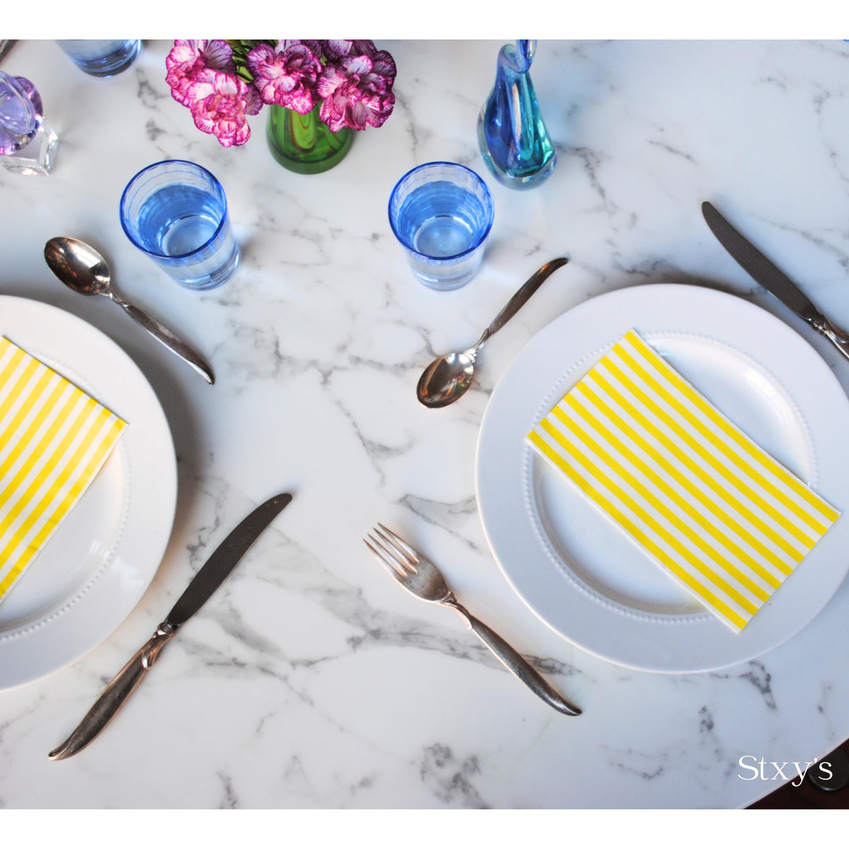 Stxy's wedding-reception napkins add color and elegance to table settings.