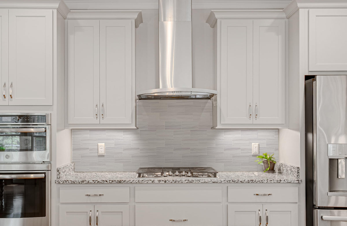 StyloVue peel-and-stick kitchen backsplash demonstrates simple, tool-free installation.