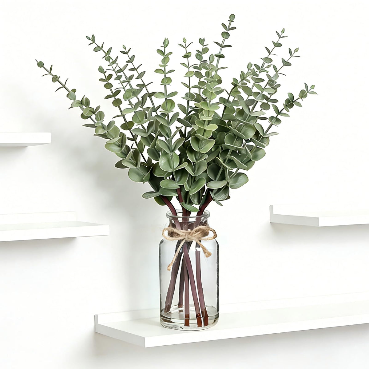 Suaycy artificial eucalyptus stems in glass vase for timeless tabletop decor.