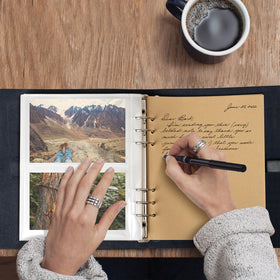 Internal Love Tree pages opened, showing multiple pockets for organized photos
