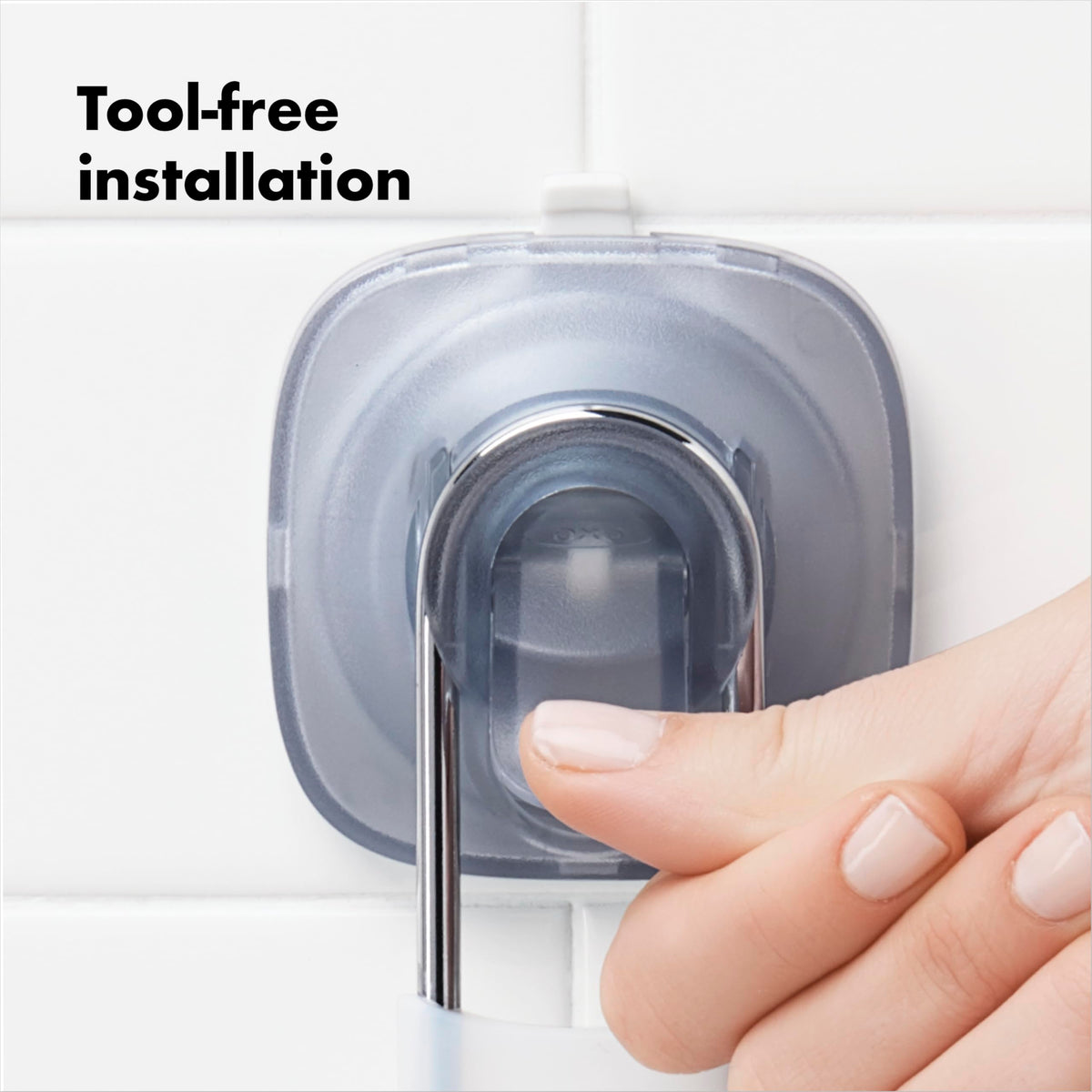 OXO cups slide to avoid grout lines for a neat shower corner.
