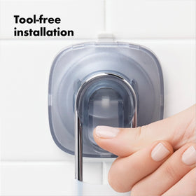 OXO cups slide to avoid grout lines for a neat shower corner.