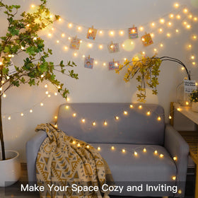 suddus Globe String Lights on a Christmas tree with warm glow