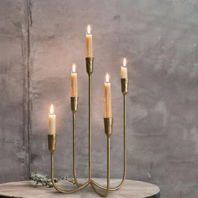 Sujun candelabra designed to hold three taper candles for versatile lighting