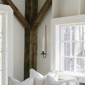 SUJUN farmhouse candle holder enhances fireplace area with minimalist lines.