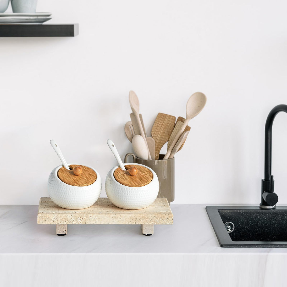 Sumlus travertine tray pedestal beside a kitchen sink for compact storage.