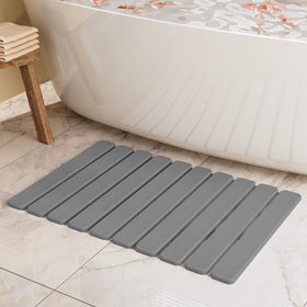 Summer&Kiss foldable stone bath mat laid flat, showing space-saving design and quick-drying surface.