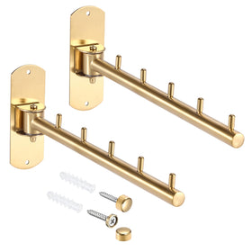 Sumnacon wall-mounted clothes rack with swing arm in gold for compact drying.
