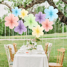 SUNBEAUTY baby shower decor with pastel paper fans creates soft, festive vibes