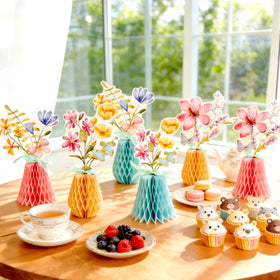 SUNBEAUTY honeycomb centerpiece set showcases pink and blue florals for festive spring decor.