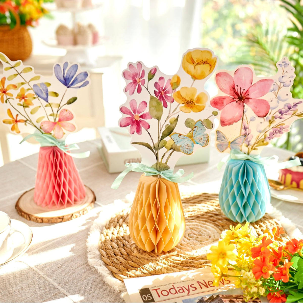 SUNBEAUTY reusable paper centerpieces fold flat for easy storage between events.