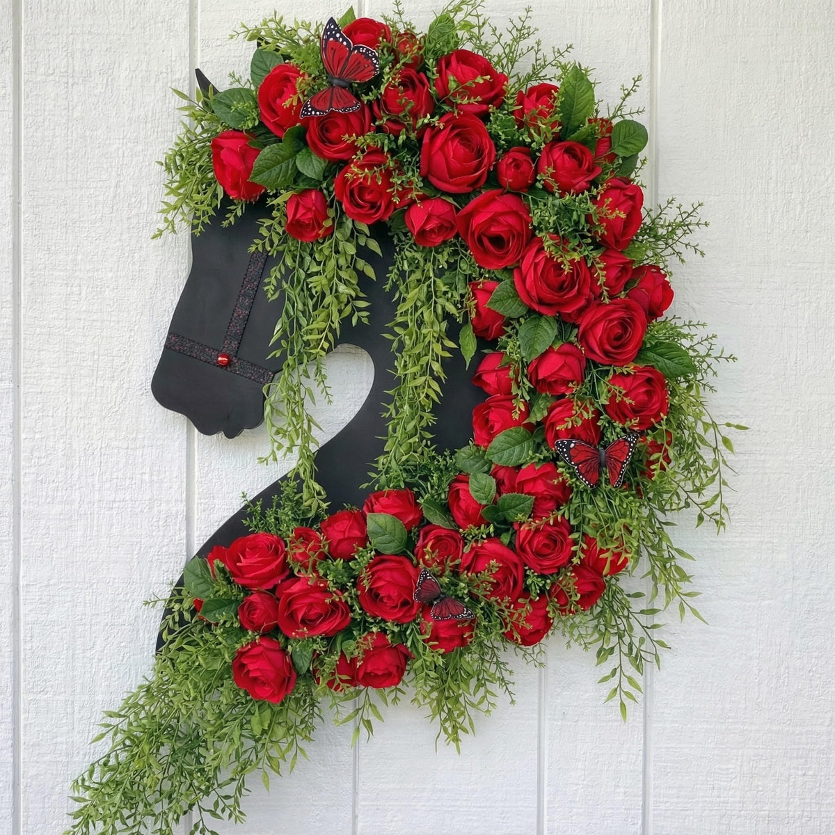 Suncalla Derby Horse Wreath on front door with bold derby colors and fabric texture.