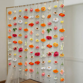 Suncalla garland draped on stairs creates flowing, romantic decor.
