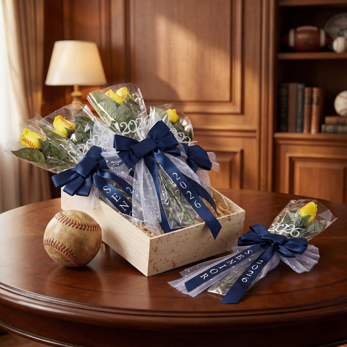 Suncalla table display with 13-inch softball rose for tributes