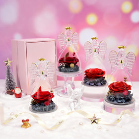 Sunia preserved rose in a 3-inch angel figurine for display.