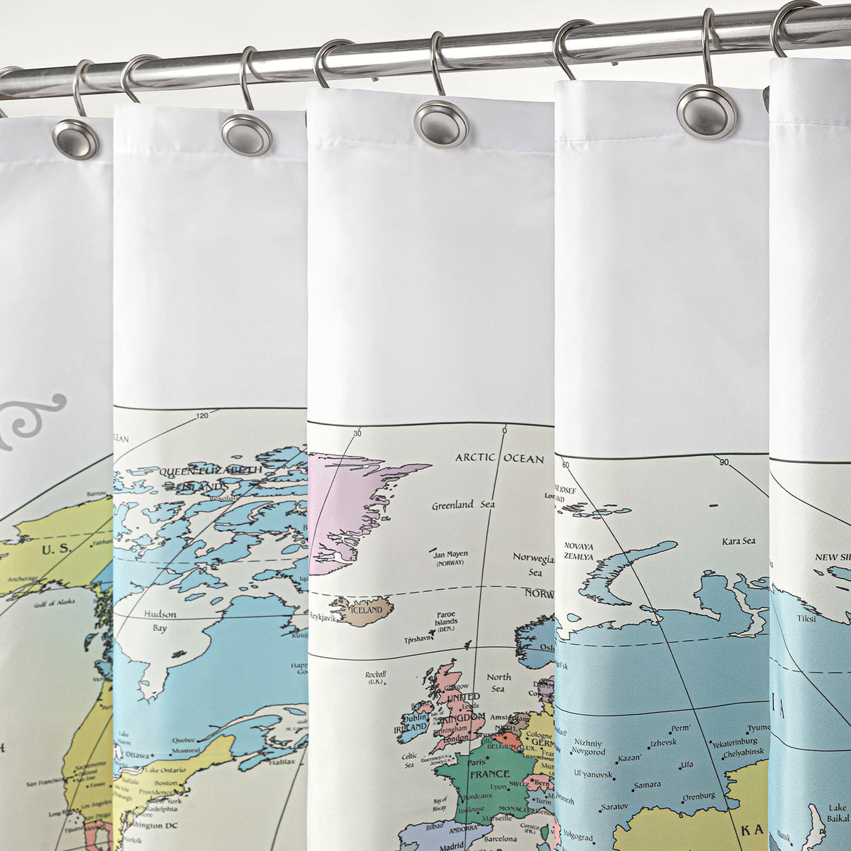 Sunlit water-repellent fabric curtain keeps bathroom dry and easy to clean.
