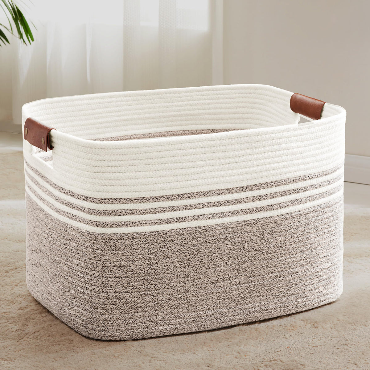 SunNewt 86L laundry basket with leather handles for sturdy laundry organization in stylish home storage.