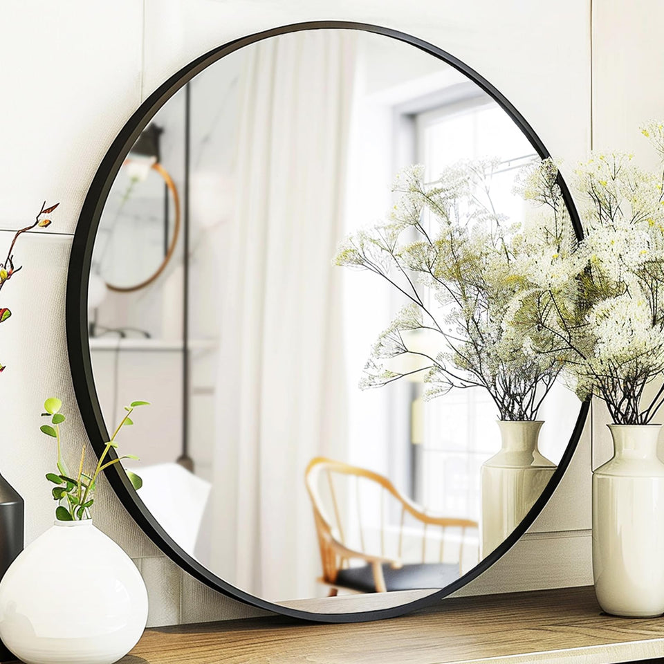 Sunniry round 22-inch mirror with black frame enhances living room ambiance