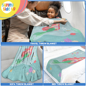 Travel-ready compact design of the Little Mermaid blanket is ideal on trips.