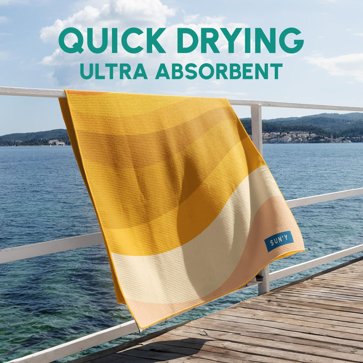SUN'Y large 63-by-31.5-inch towel offers generous sunbathing space.