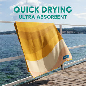 SUN'Y large 63-by-31.5-inch towel offers generous sunbathing space.