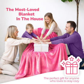 Super Blanky blanket on sofa shows an oversized drape for cozy couch moments