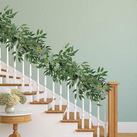 Supla garland draped on fireplace mantel creates instant greenery and warmth.