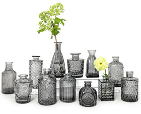 SUPMIND Bud Vase set of 12 in black with etched patterns for elegant centerpieces.