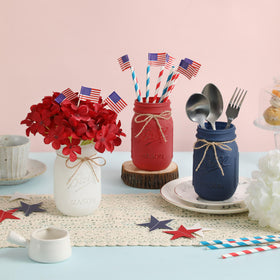 Red, white, and blue mason jar set ready for Memorial Day or July 4th.
