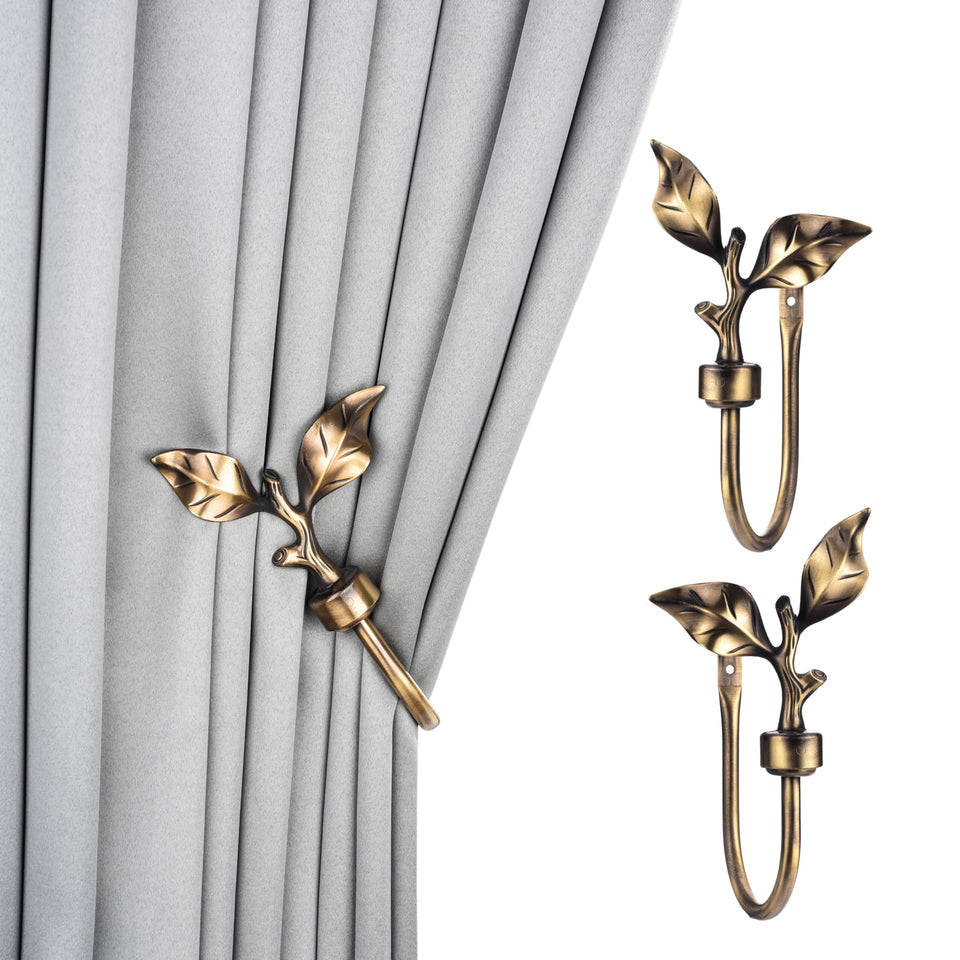 SUQ I OME leaf-curtain-holdback in antique brass adds classic charm to windows.