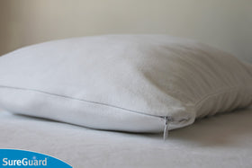 SureGuard pillow protectors with Invisi-Zip bed bug proof zipper seal pillows.