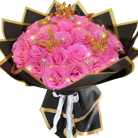 Suryushi pink glitter roses bouquet shines as a bright centerpiece for any room.
