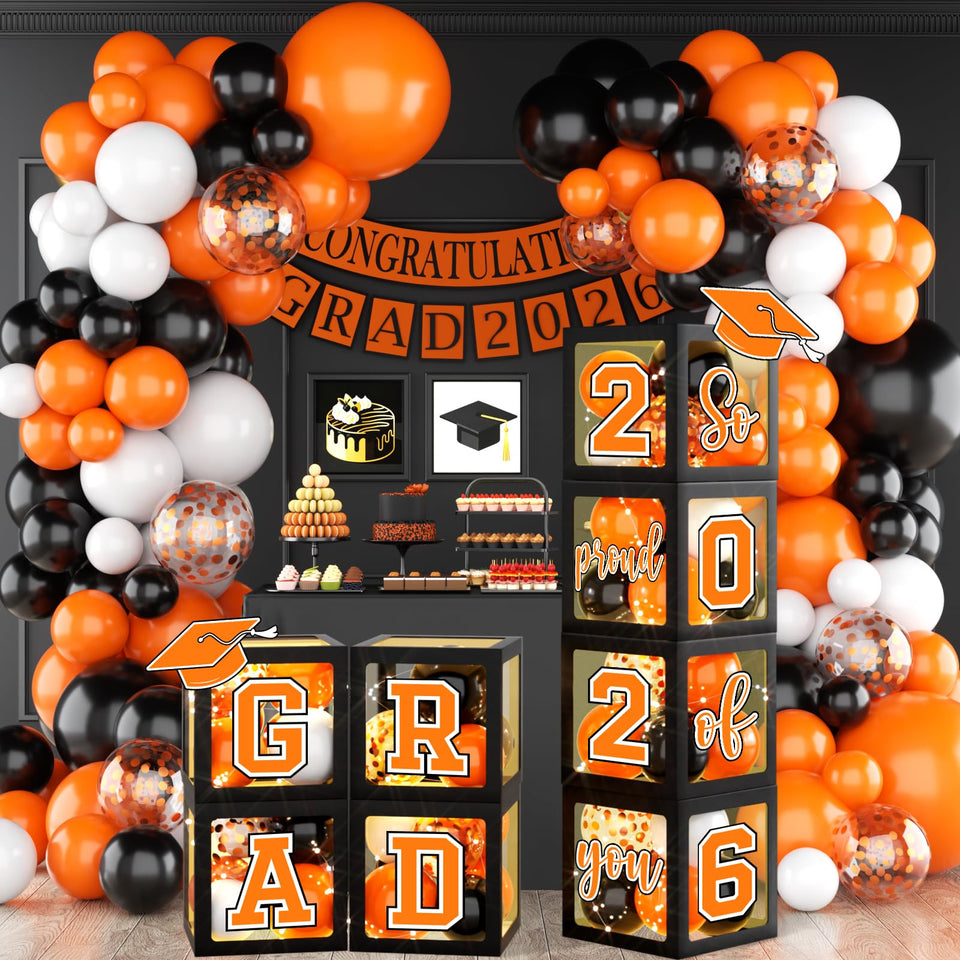 Suzkoqo graduation balloons and boxes create a polished 2026 backdrop.