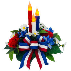 Svndlyn patriotic centerpiece with red-white-blue flowers and candles for Independence Day celebrations.