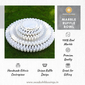 Swadeshi Blessings Antique Scallop Bowl closeup highlights mirror finish.