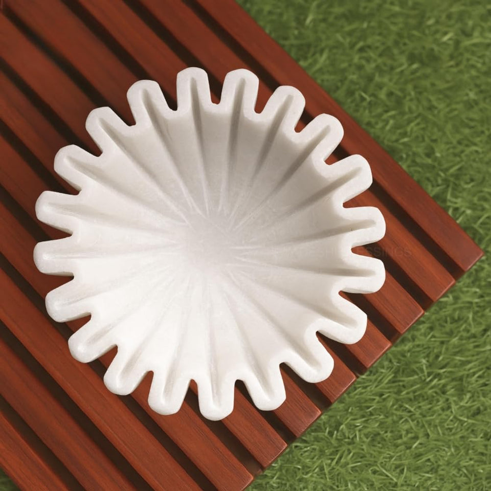 SWADESHI BLESSINGS marble ruffle bowl with mirror finish for an elegant centerpiece.