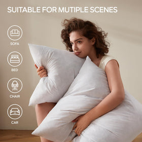 Swandream bed pillows styled in a cozy bedroom arrangement.